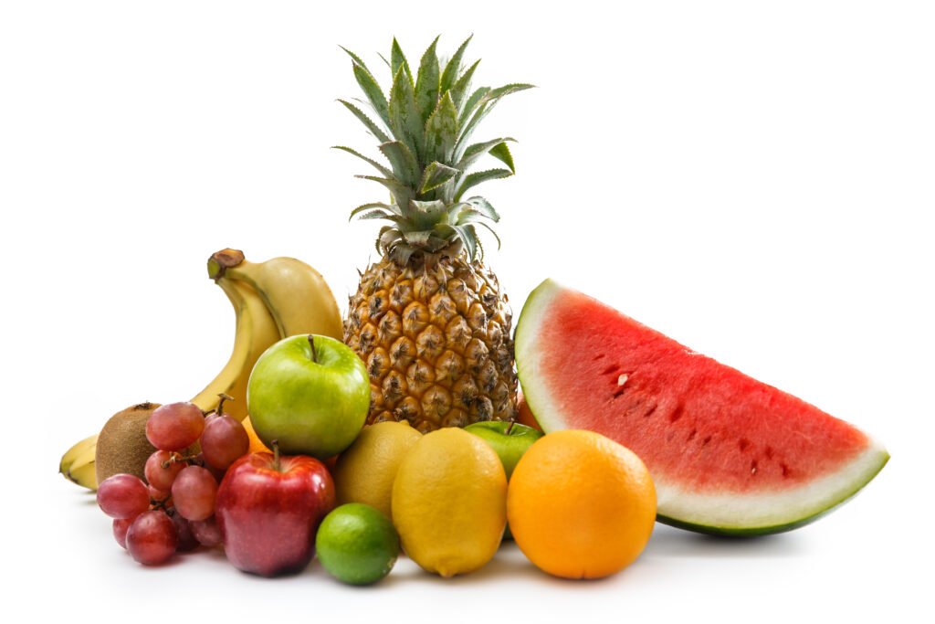 assortment of tropical fruits isolated on white background